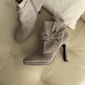 Light gray suede ankle boots with a half inch stack and 3 inch heel